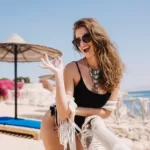 shapely cheerful girl black bodysuit laughing posing with okay - Thợ Kỹ Thuật