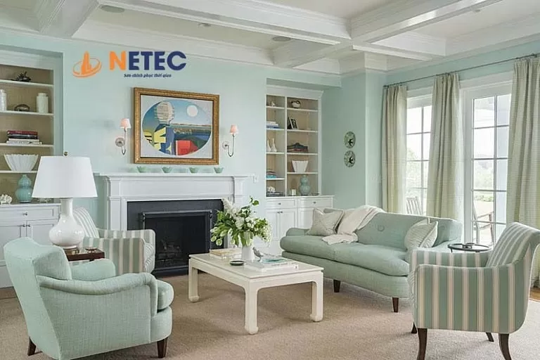 Phòng khách sơn màu xanh ngọc bích hiện đại và sang trọng do Thợ Miền Nam thực hiện