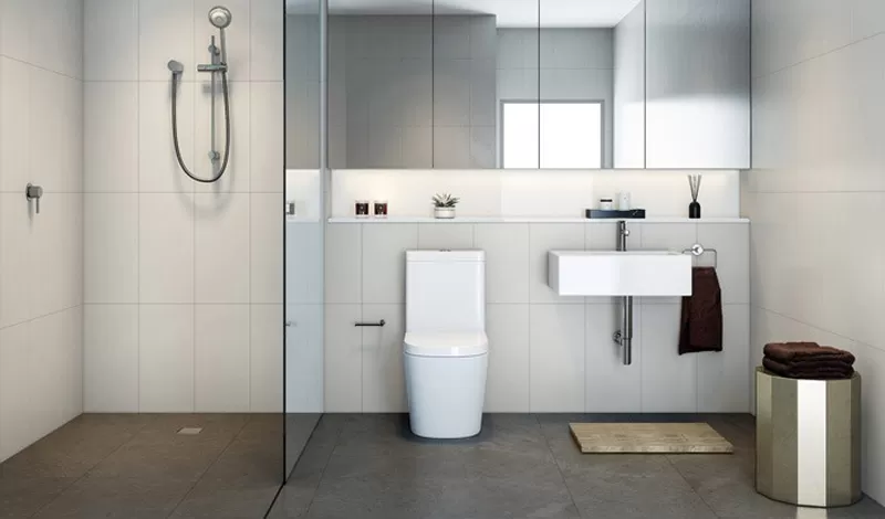 Mẫu nhà vệ sinh đơn giản mà vẫn đảm bảo thẩm mỹ với gạch ốp lát vân đá và đèn trang trí
