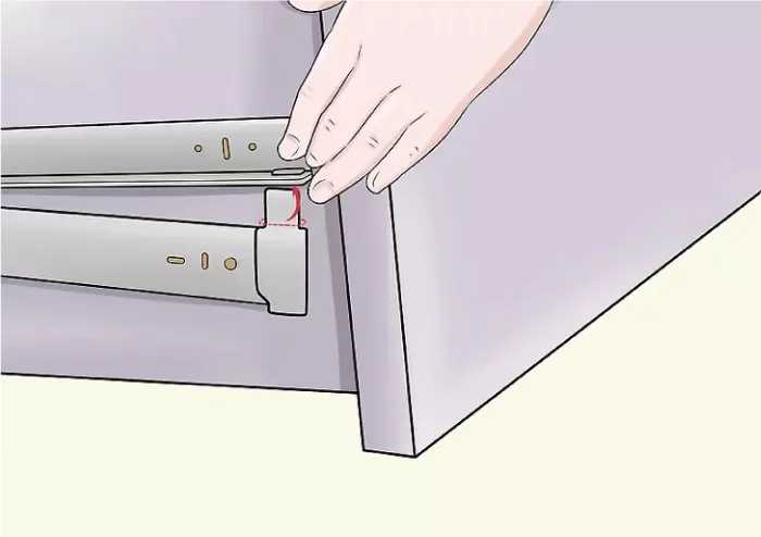 Nâng ngăn kéo tủ bắt vít lên để tách ray trượt