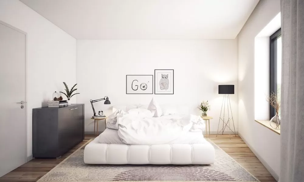 Phòng ngủ 9m2 phong cách hiện đại với gam màu trắng chủ đạo, điểm nhấn màu xanh dương tươi mát, tạo cảm giác rộng rãi và thoáng đãng.